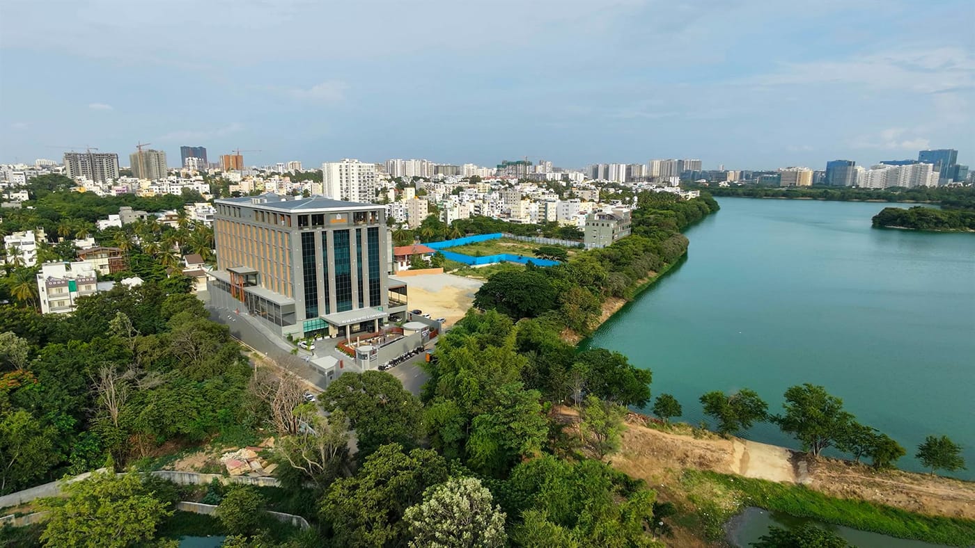 Aerial view of RG Grand Hotel & Convention beside Rachenahalli Lake, Bengaluru