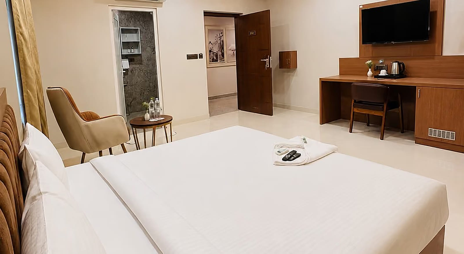 Jal Mahal Deluxe Room with a king bed, work desk and TV at Lime Tree Hotel & Banquet, Jaipur