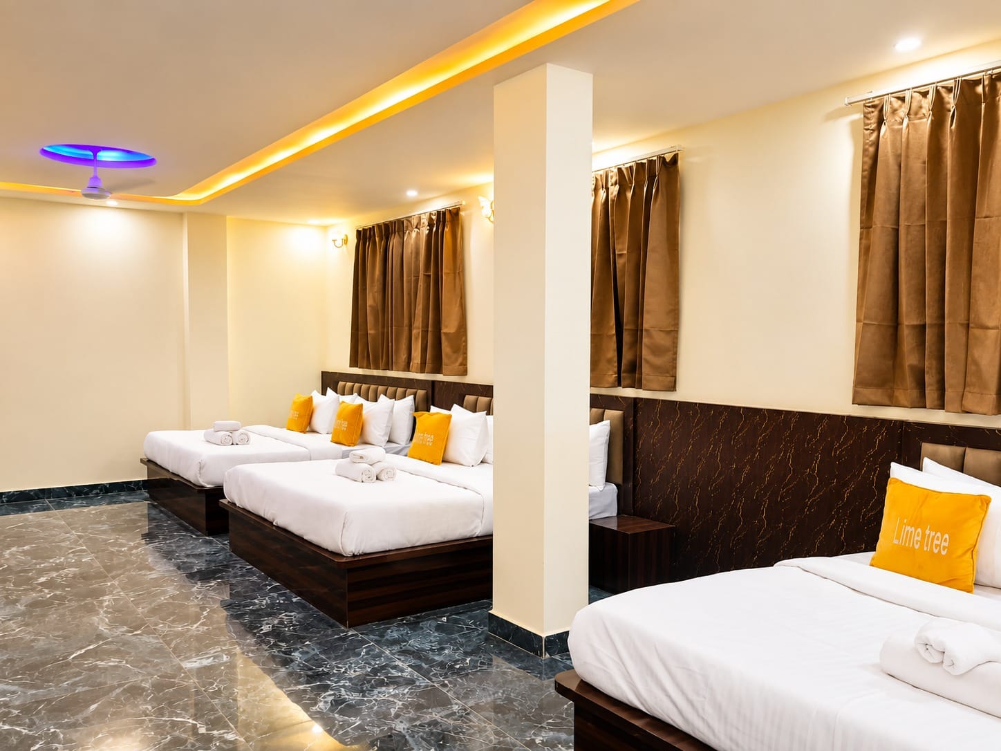 Family Suite king beds under a cove-lit ceiling at Lime Tree Hotel, Vrindavan