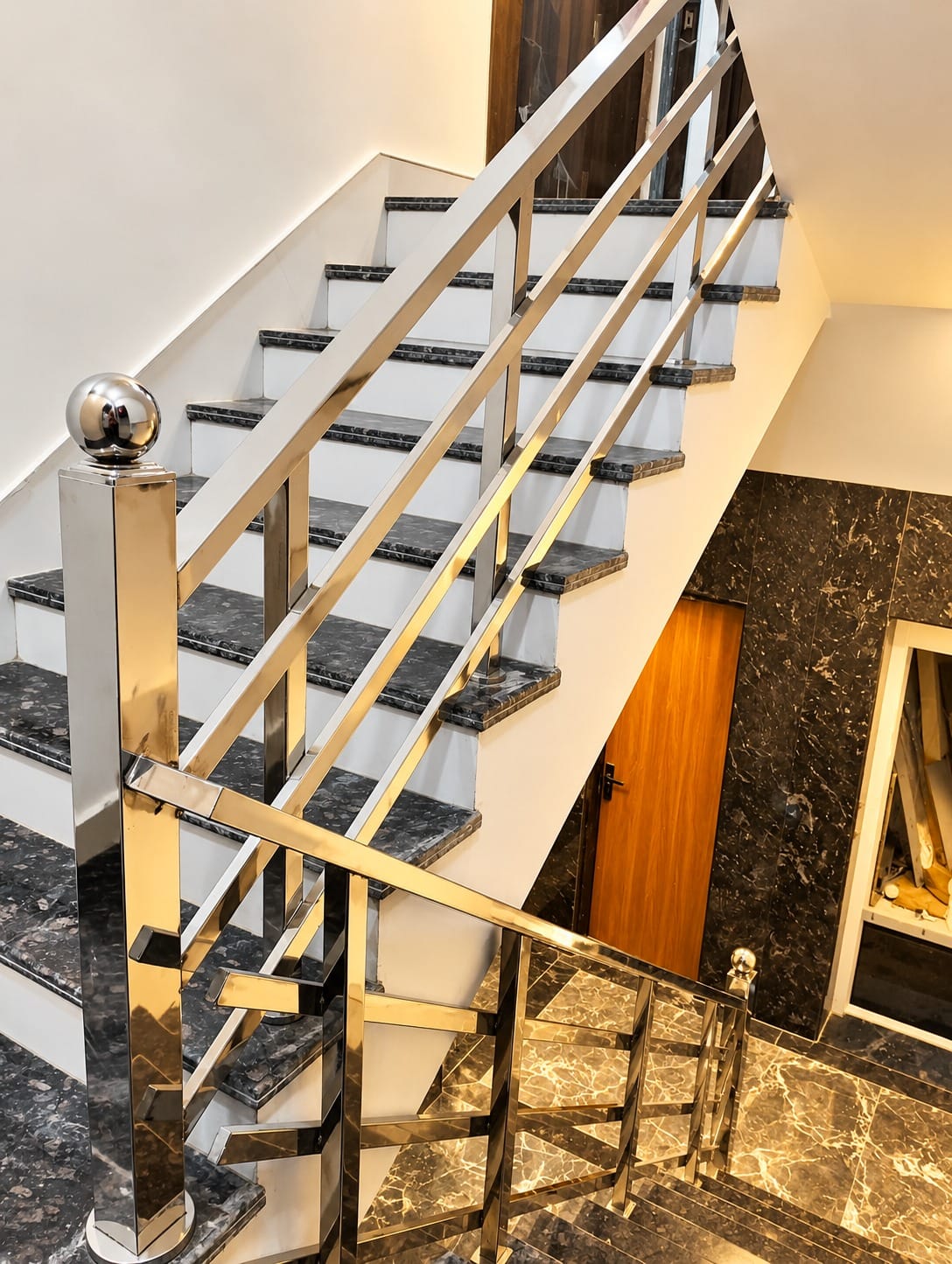 Steel railing over the marble staircase at Lime Tree Hotel, Vrindavan