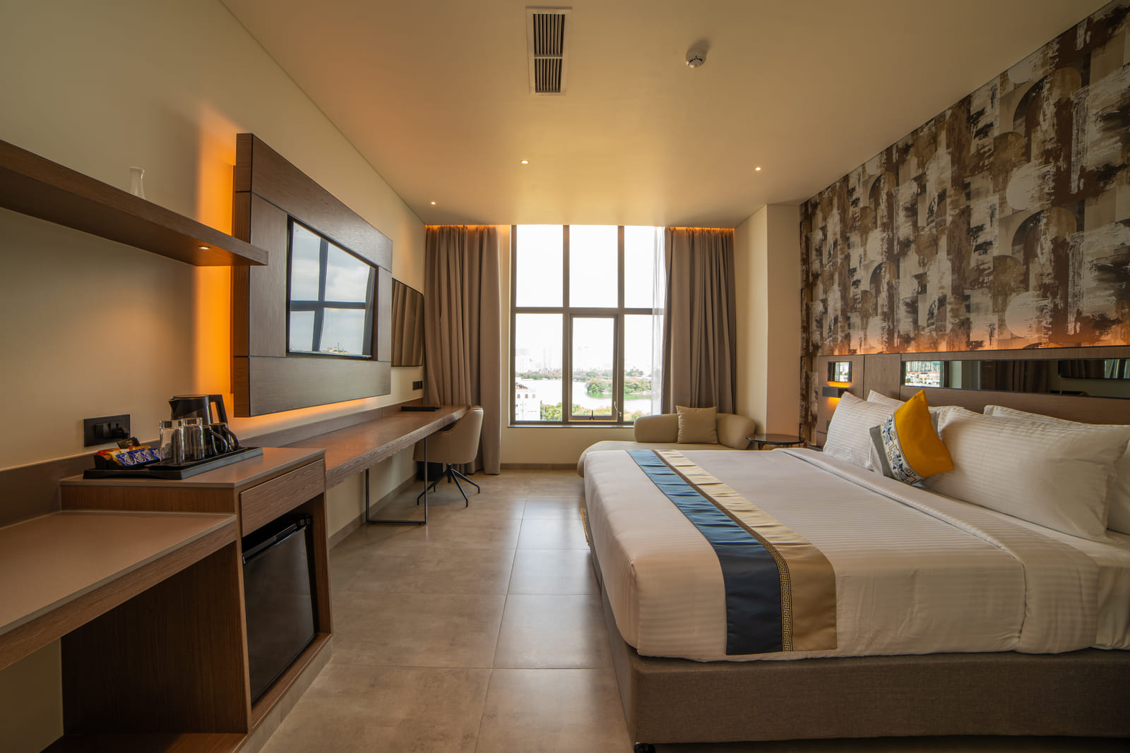 Deluxe King &mdash; The king room, looking to the window