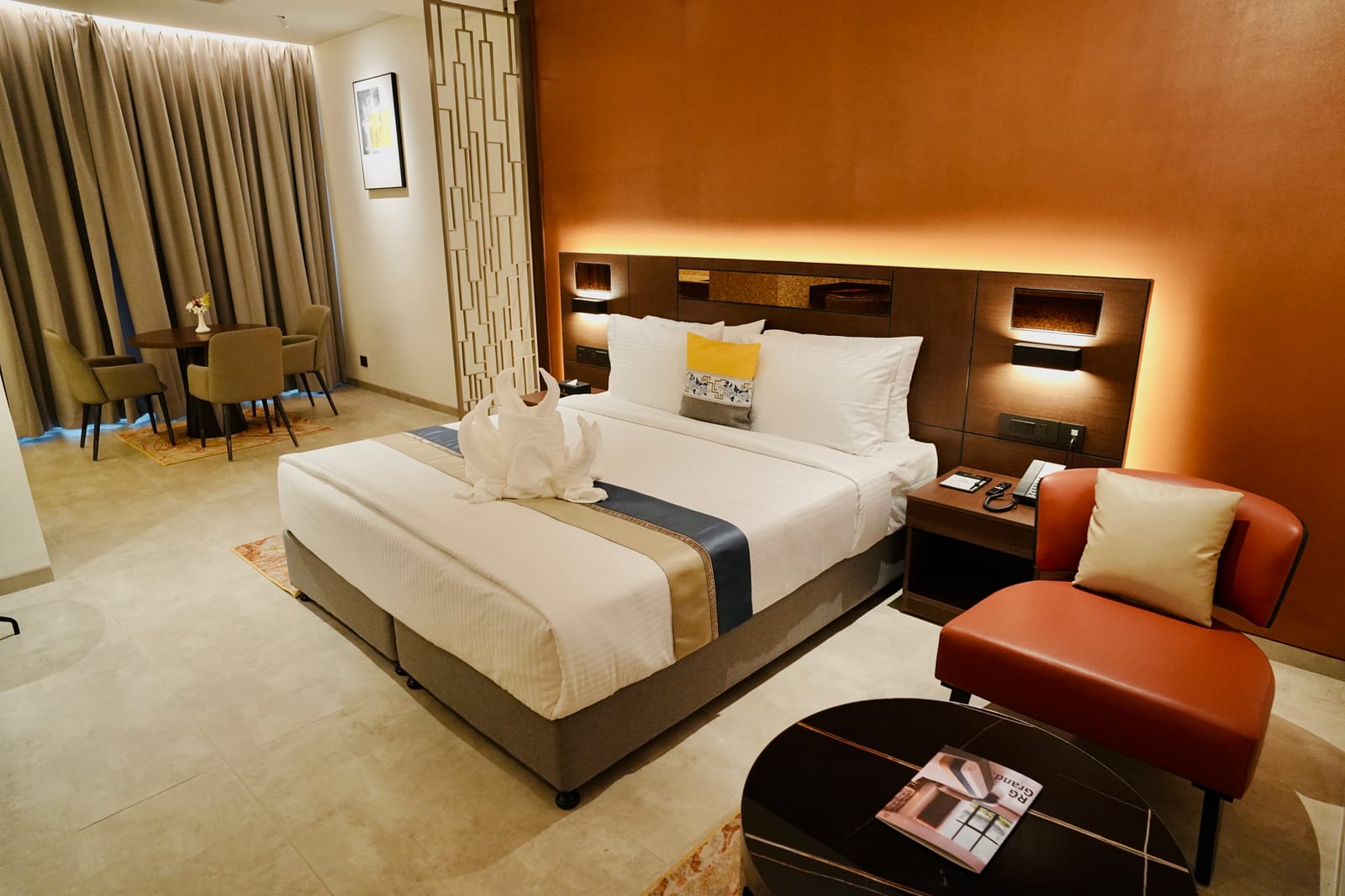 Deluxe Suite &mdash; Bedroom and lounge seating