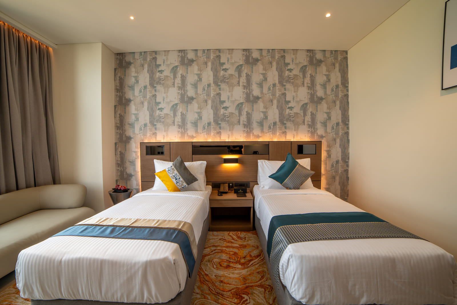 Deluxe Twin &mdash; Both beds, with the headboard wall
