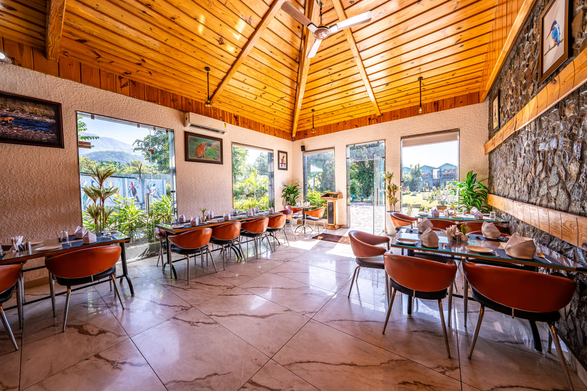 Interior of Spring Restaurant at Corbett Nirvana Resort