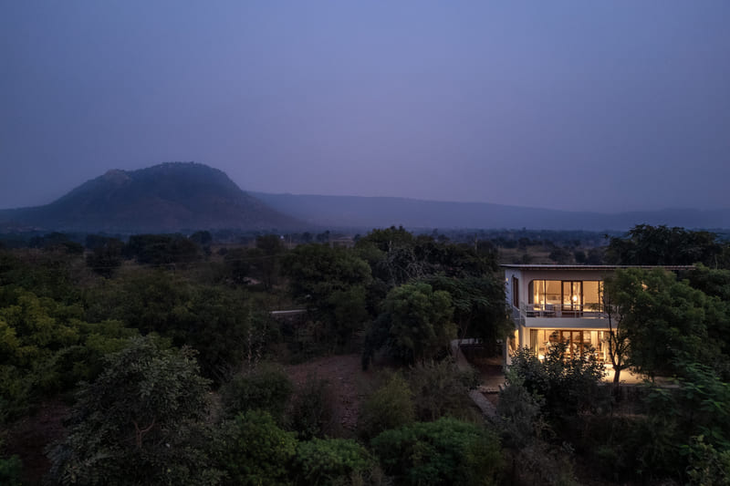 Forest Villa set among the trees at dusk