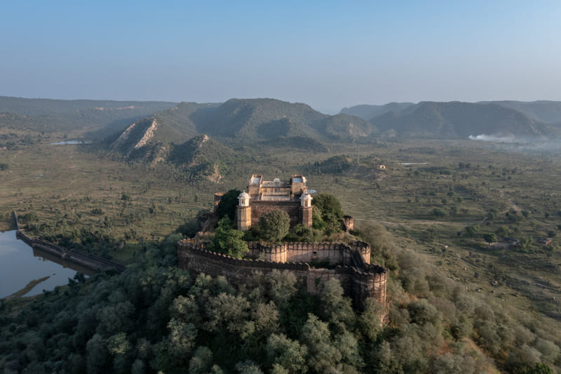Kankwari Fort on its wooded hilltop inside the reserve