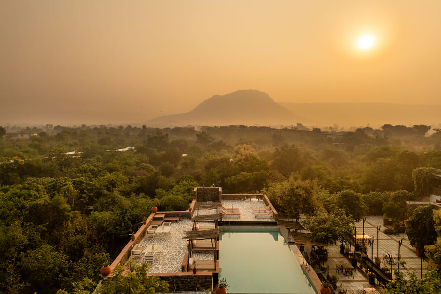 A sundowner setup among the Aravalli boulders