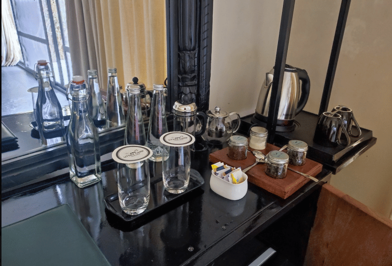 Glass bottles and carafes set out in the rooms