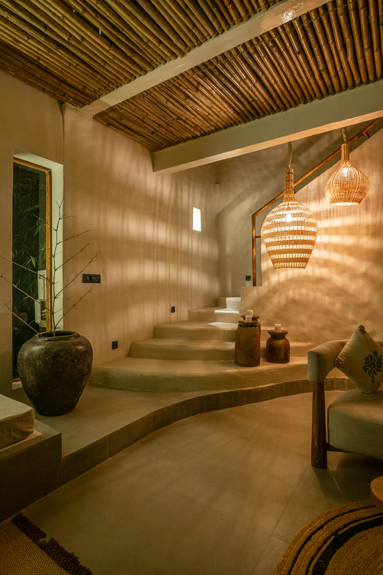 Spacious living room with woven pendants