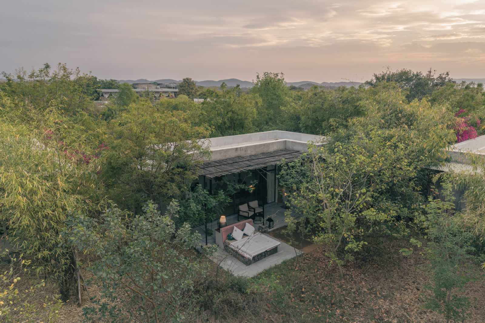 A Stone Cabin and its private patio tucked into the scrub forest
