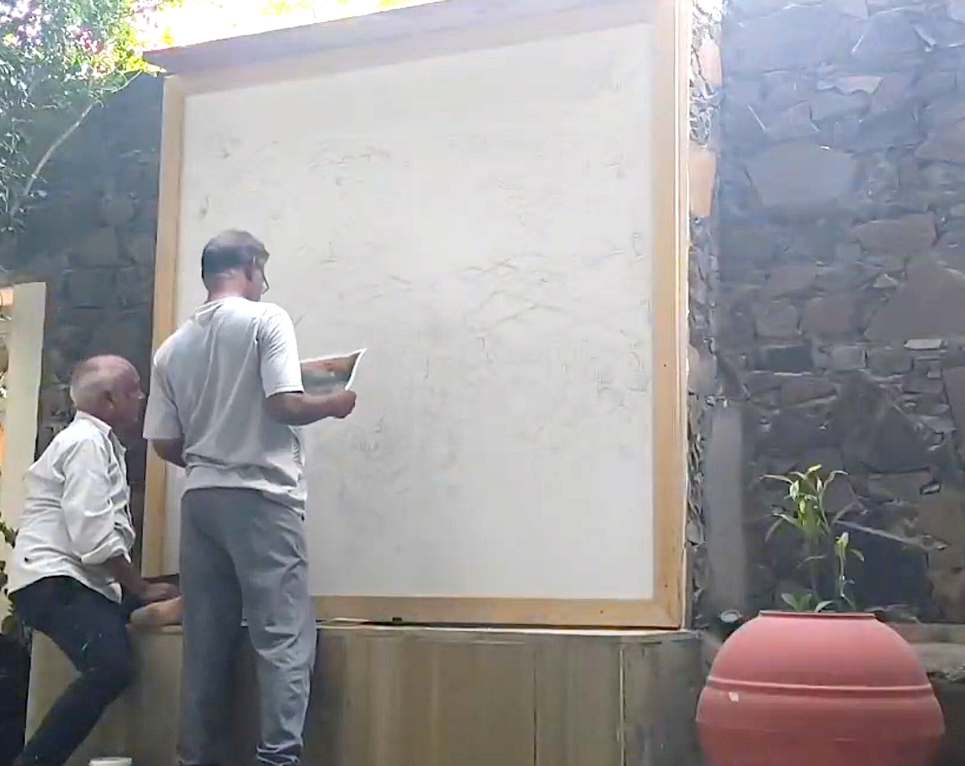 Artists preparing the base sketch for the naturalist map at Utsav Camp Sariska.