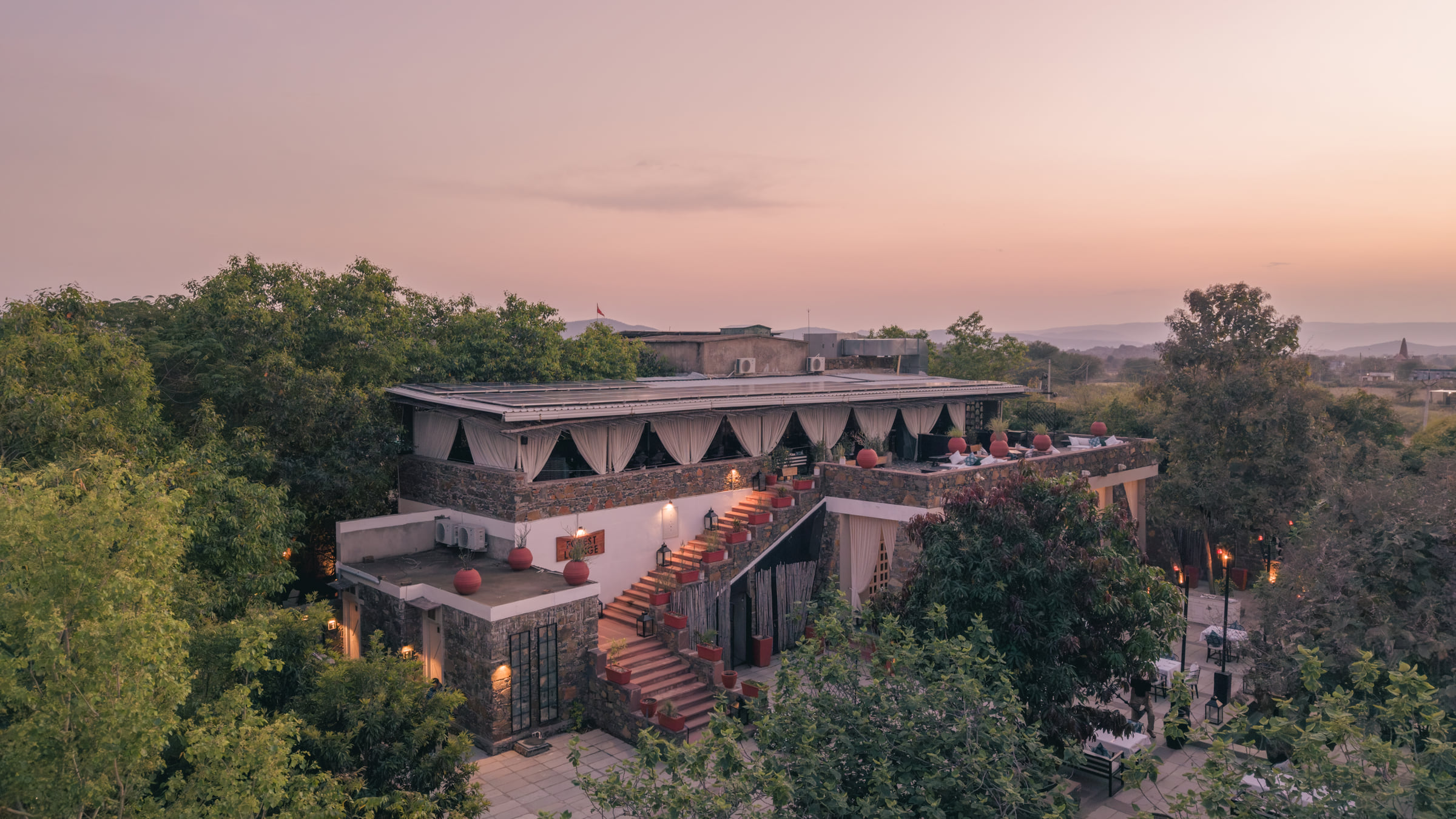 The forest lounge at dusk, seen from the air