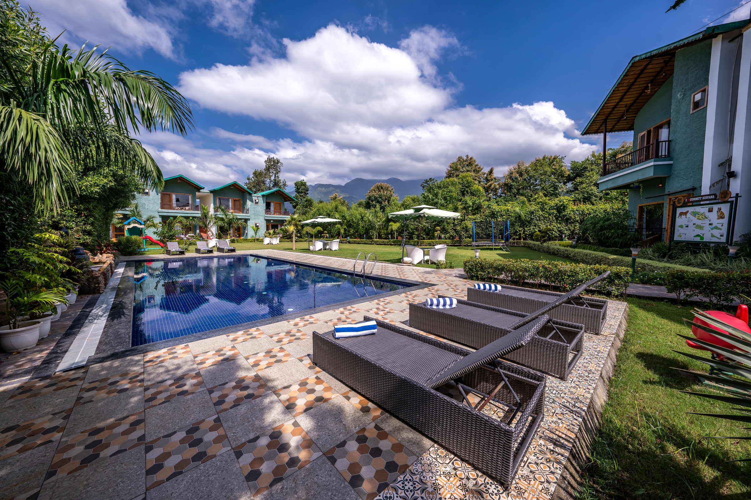 Swimming pool at Corbett Nirvana Resort