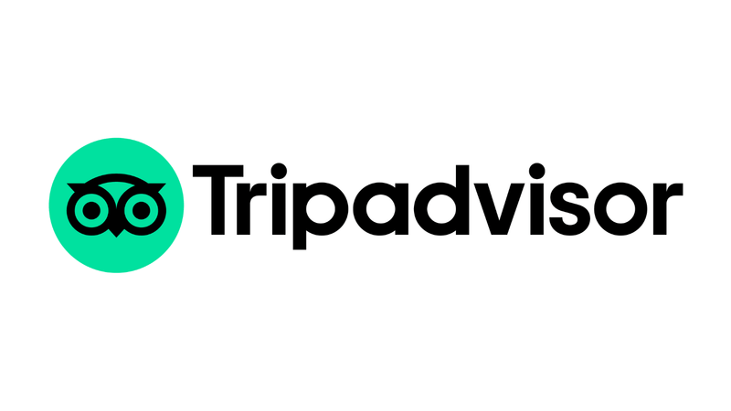 The Tripadvisor logo with the name of the brand in dark contrast against a plain white background.