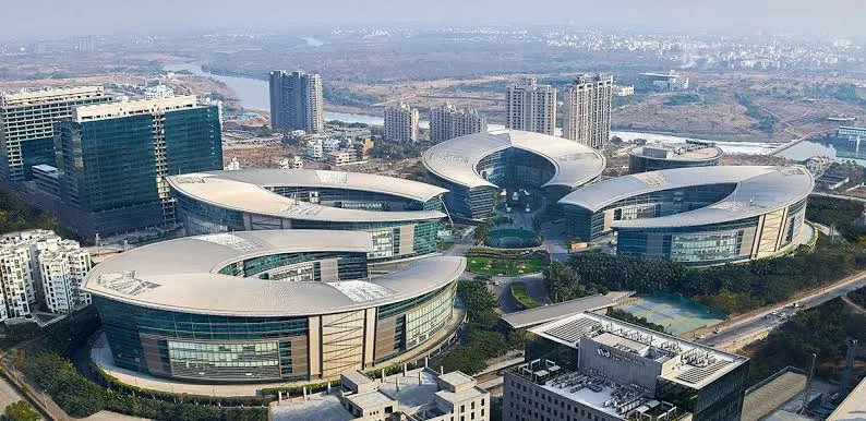 Arial view of an area with intricately designed architecture, high raise buildings, and commercial buildings.
