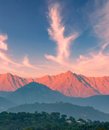 Pir Panjal mountain range at sunset — view from Hotel Sparrow Dharamshala