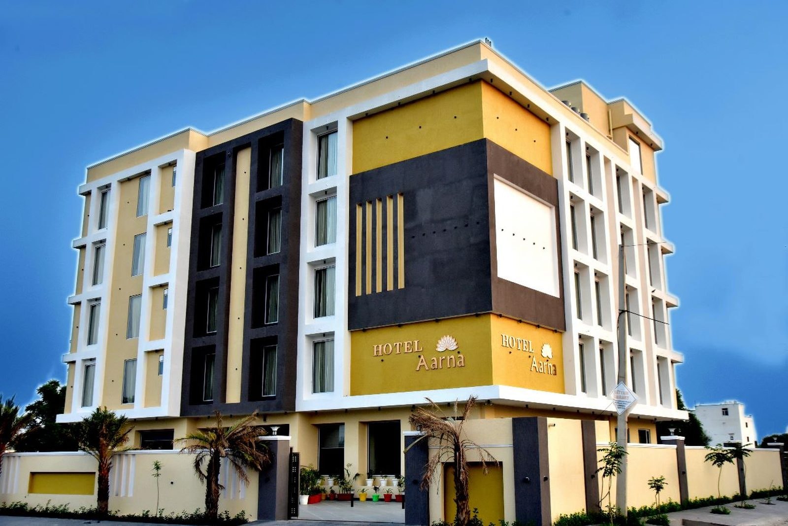 The facade of Hotel Aarna Premier by day, Jaipur