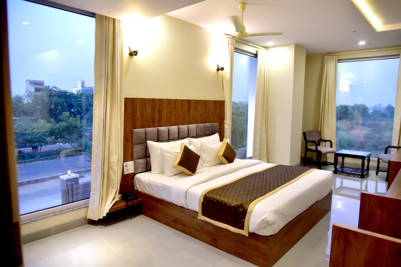 A forest-view Super Deluxe Room at Hotel Aarna Premier, Jaipur