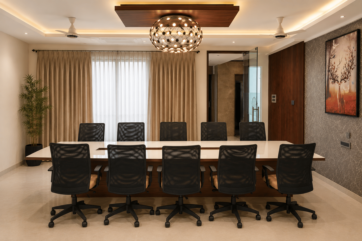 The air-conditioned Board Room with a large boardroom table and executive chairs set for meetings at Rossedale Suites & Hotel in Peelamedu, Coimbatore