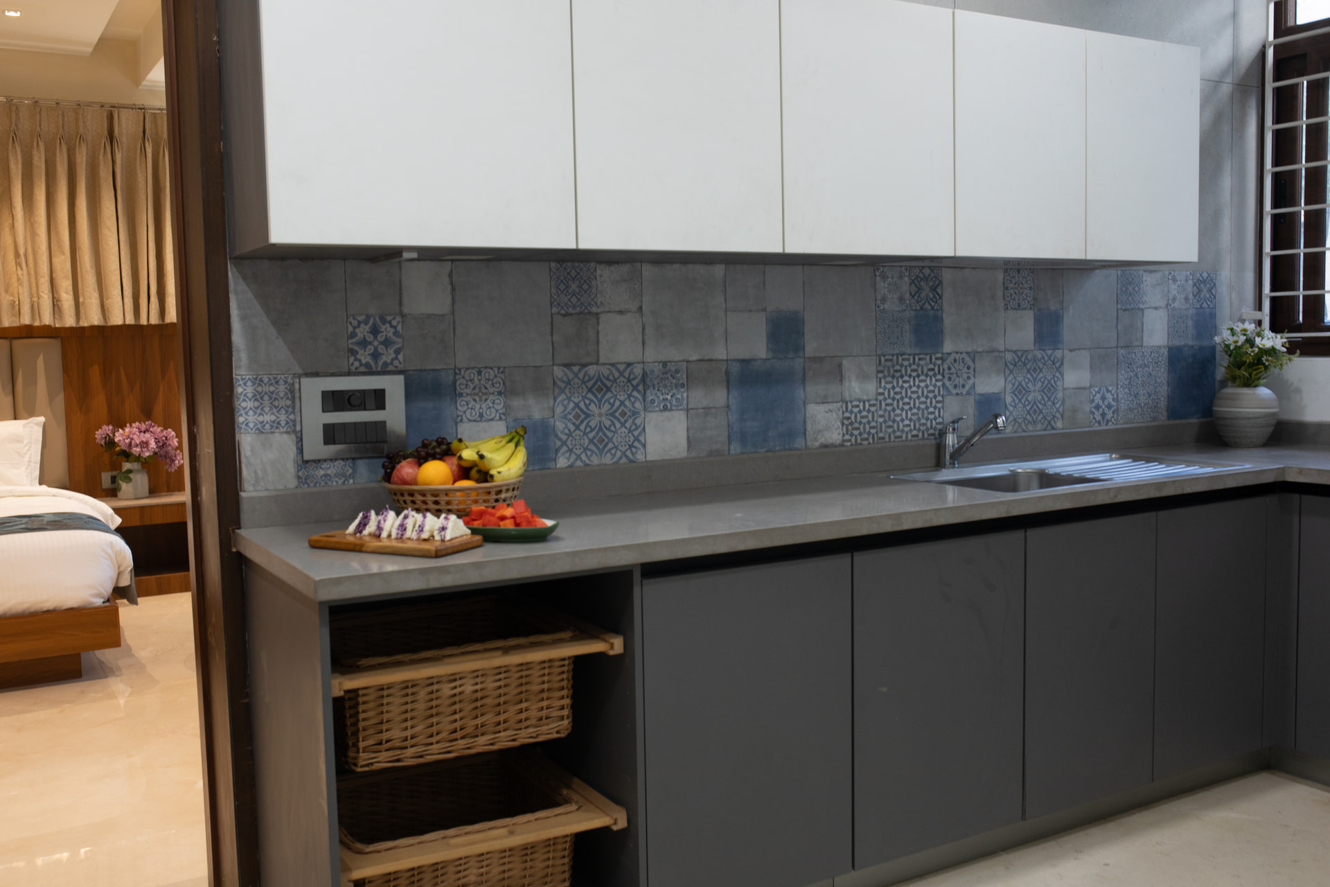 The in-room kitchenette with counter and cabinetry in the Executive Kitchenette at Rossedale Suites & Hotel in Peelamedu, Coimbatore
