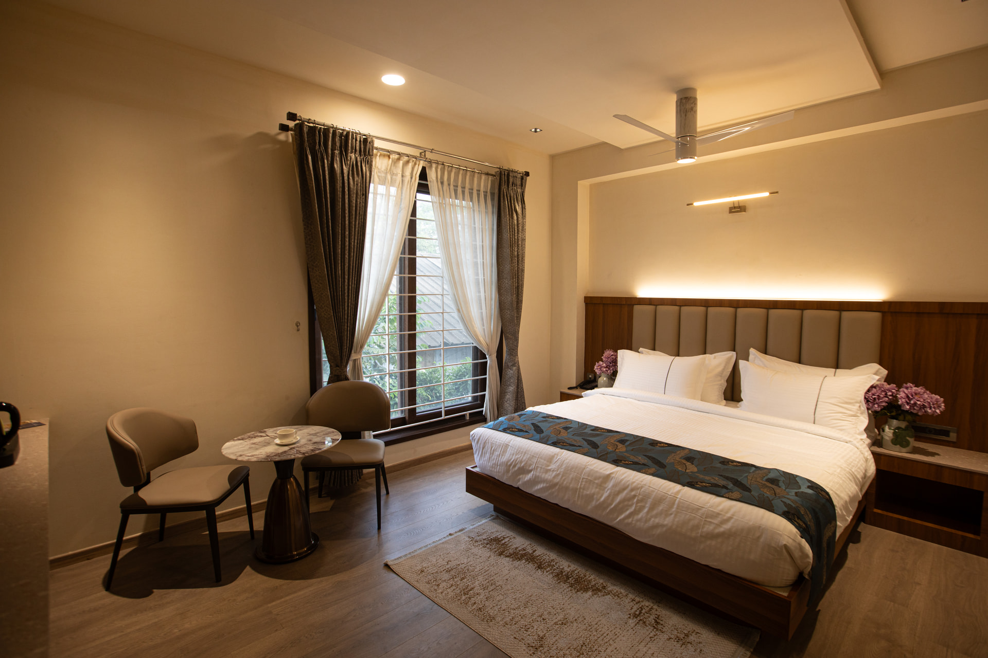 The Family Suite bedroom with a king-size bed at Rossedale Suites & Hotel in Peelamedu, Coimbatore