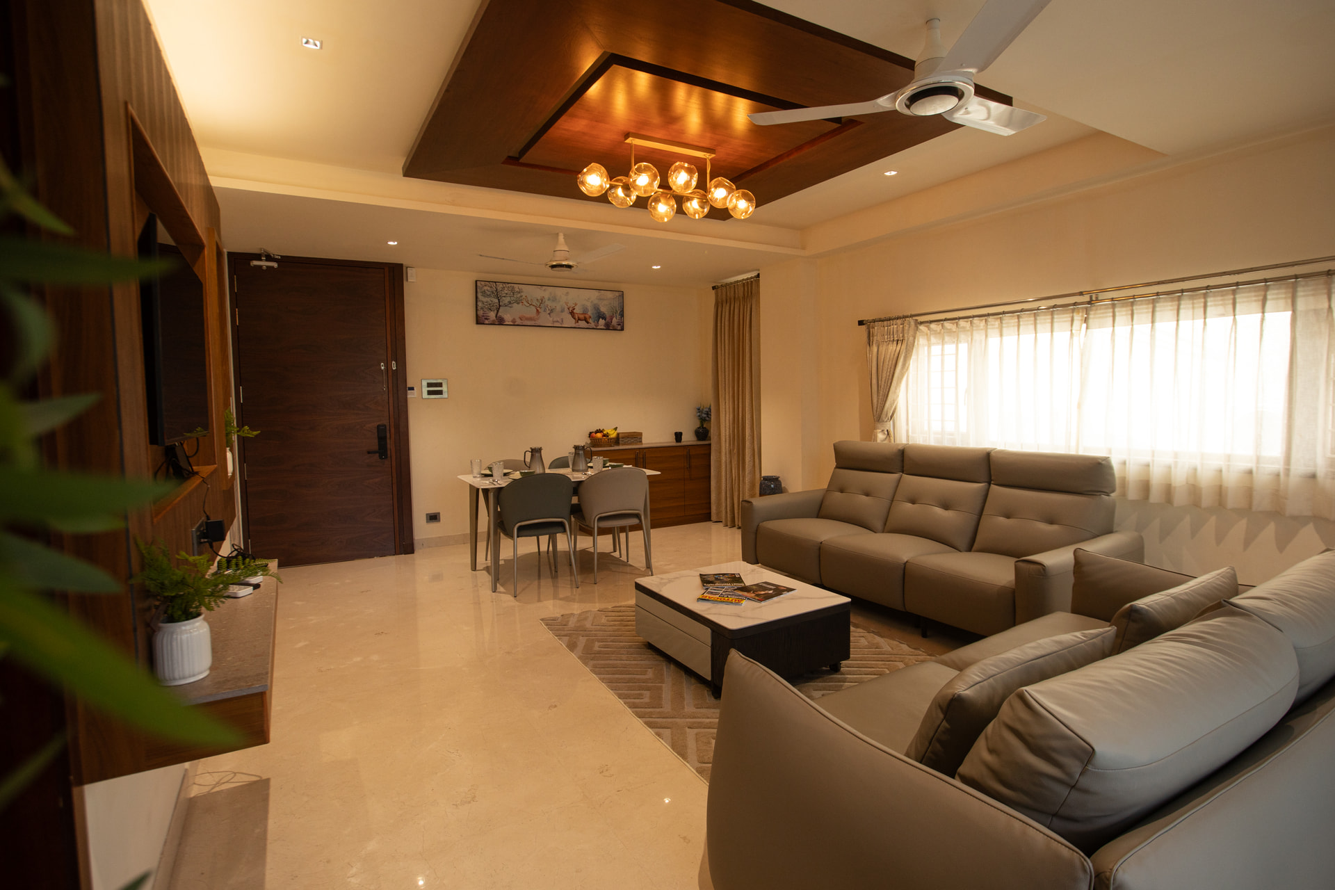 Lounge seating in the Family Suite living room at Rossedale Suites & Hotel in Peelamedu, Coimbatore