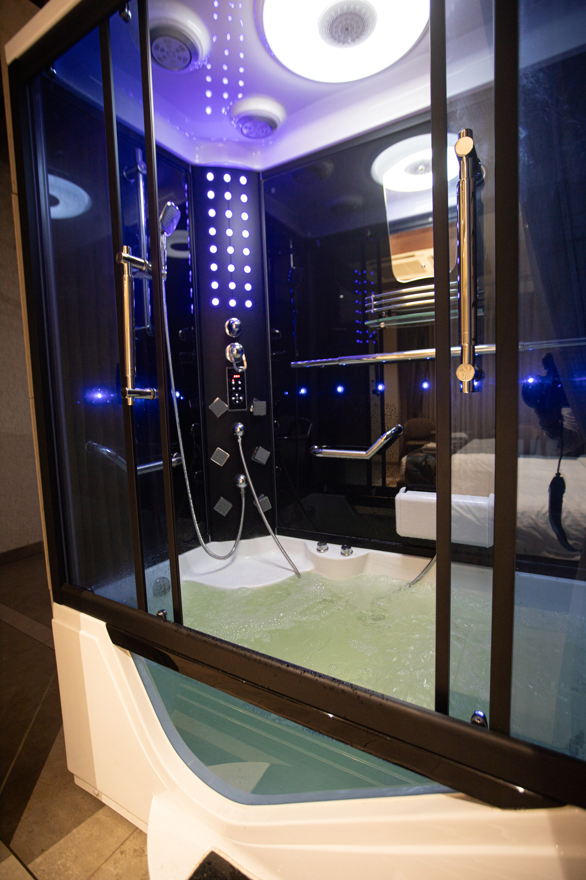 A soaking tub in the private bathroom of the Jacuzzi Room at Rossedale Suites & Hotel in Peelamedu, Coimbatore