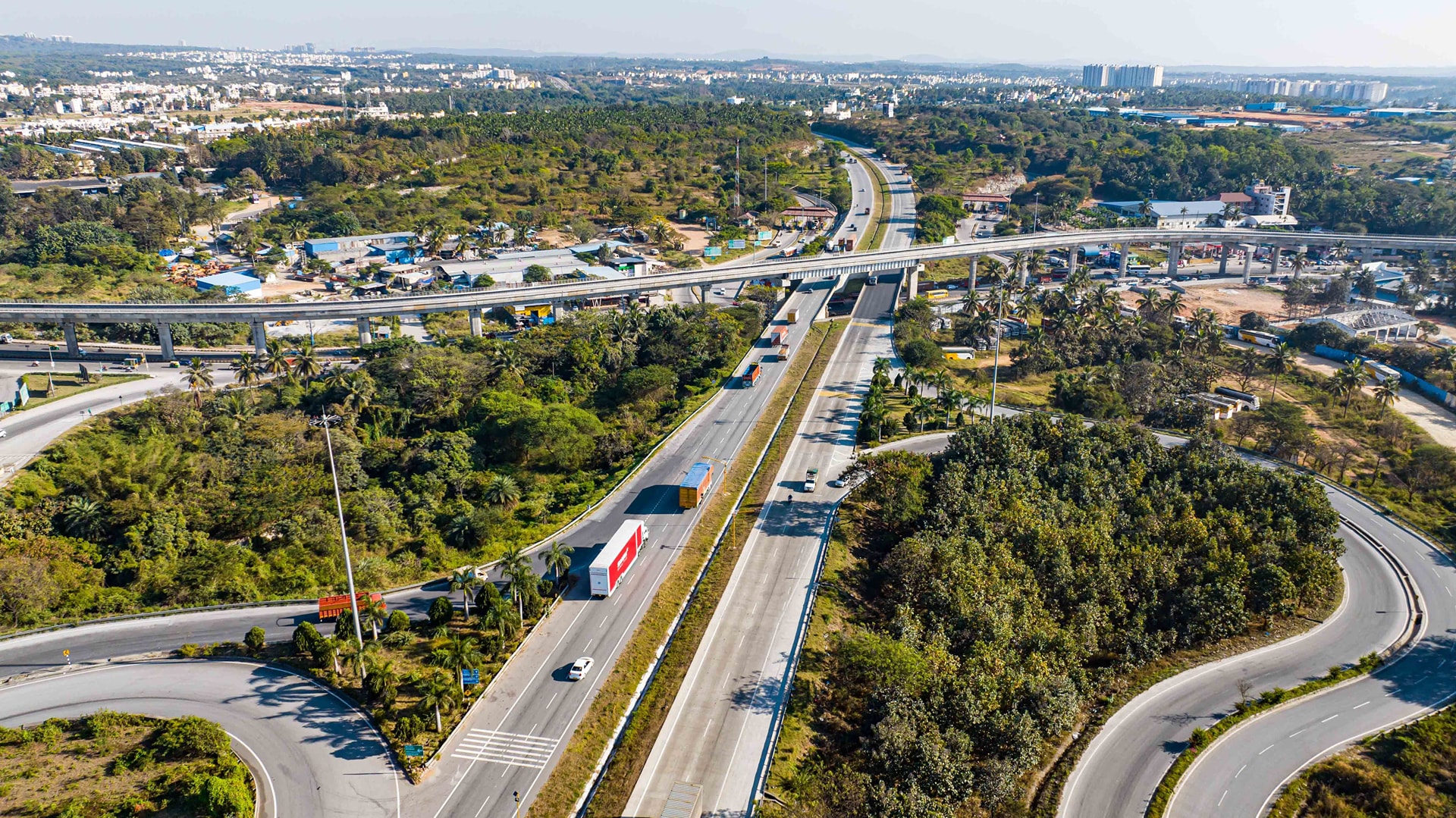 Aerial view of an expressway with office buildings along a city corridor