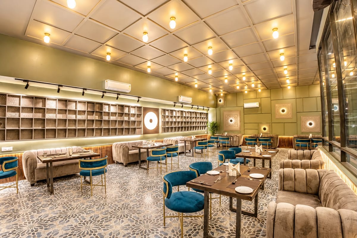 Indoor dining at Athena, the rooftop restaurant at Crestline Shubh Vilas, Jaipur