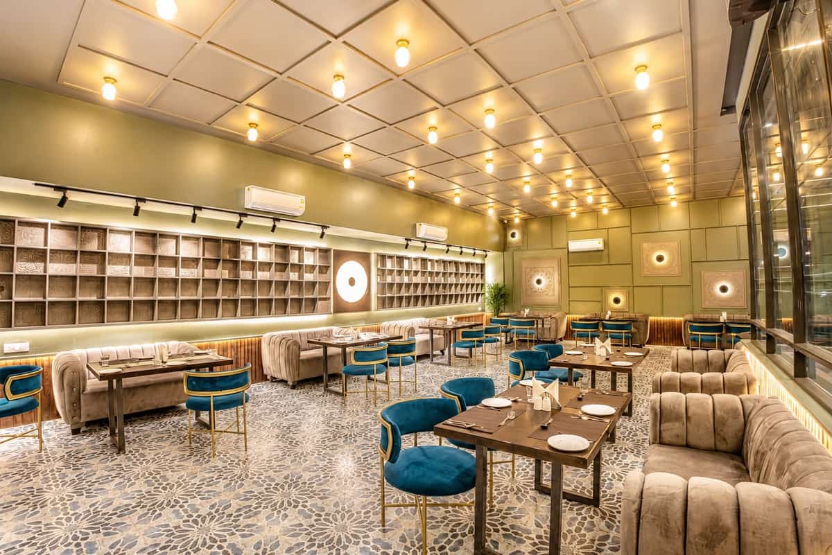 Indoor dining at Athena, the rooftop restaurant at Crestline Shubh Vilas, Jaipur