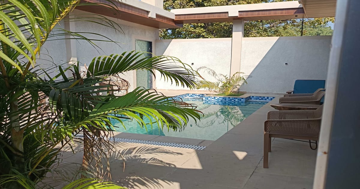 A deluxe room with private pool at Signum Resort, Bandhavgarh