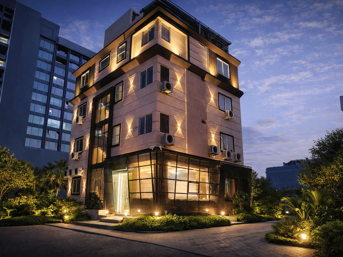 Hotel exterior evening facade lit at Signum CityScapes SKY Boutique Hotel, Indore