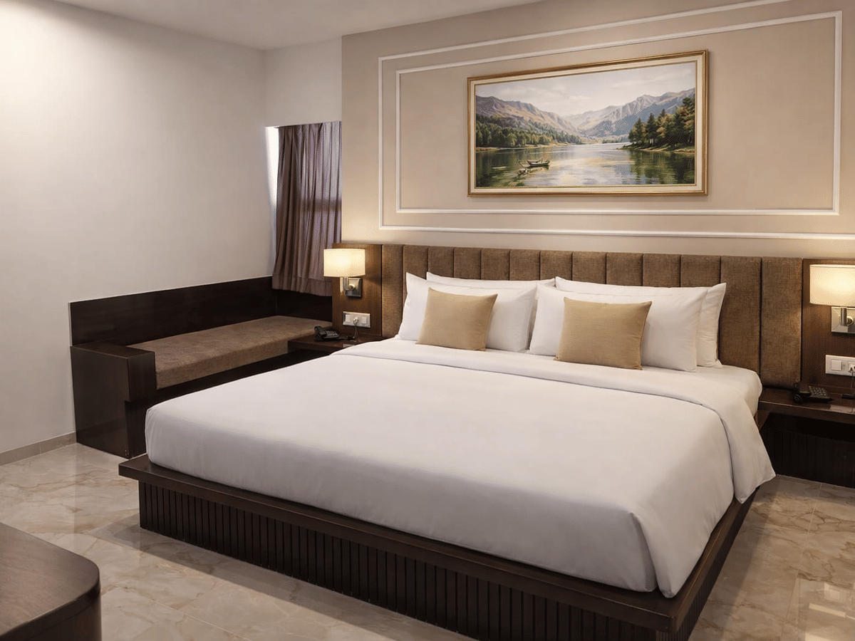 Premium room king bed at Signum CityScapes SKY Boutique Hotel, Indore