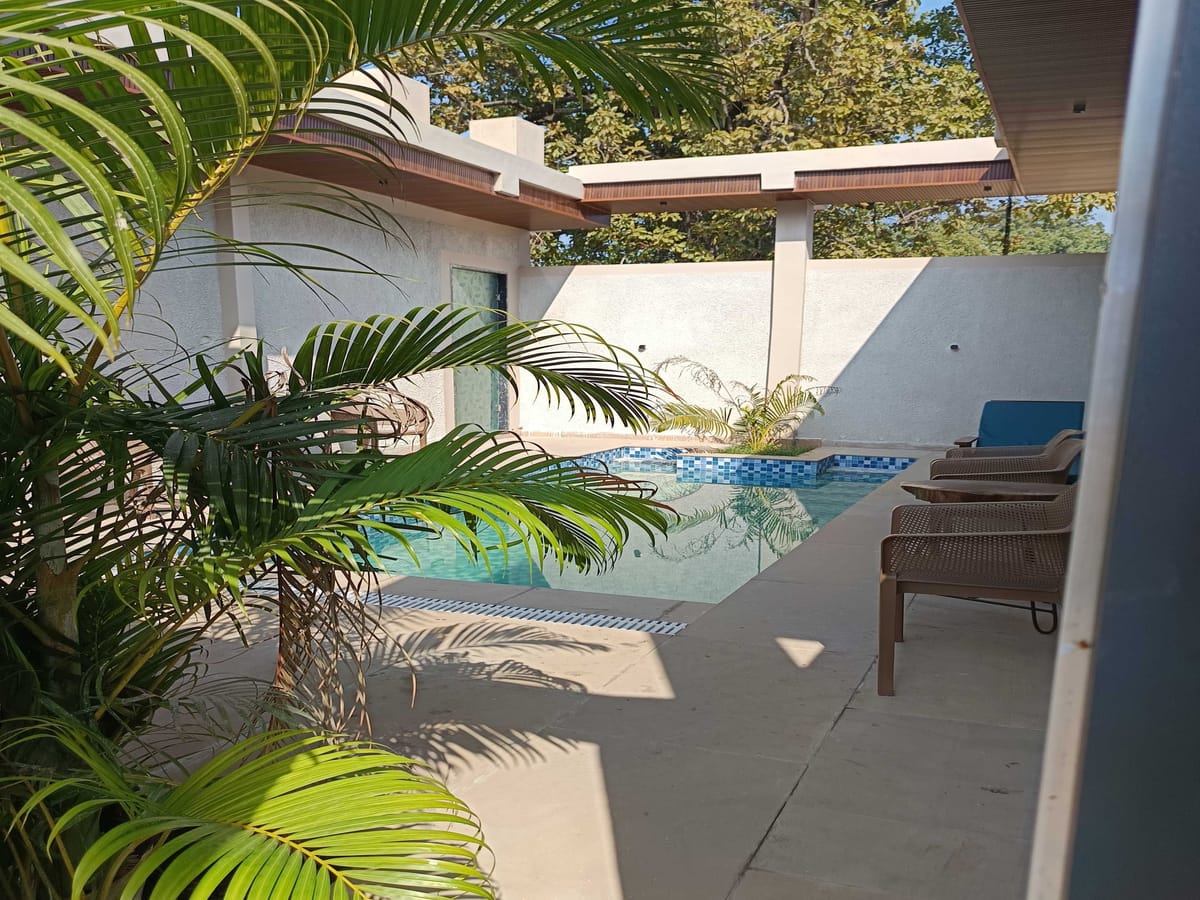 A deluxe room with private pool at Signum Resort, Bandhavgarh