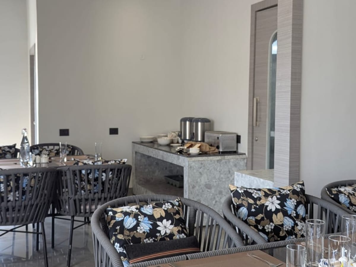 Indoor cafe seating at Signum Tathastu Boutique Hotel, Haridwar