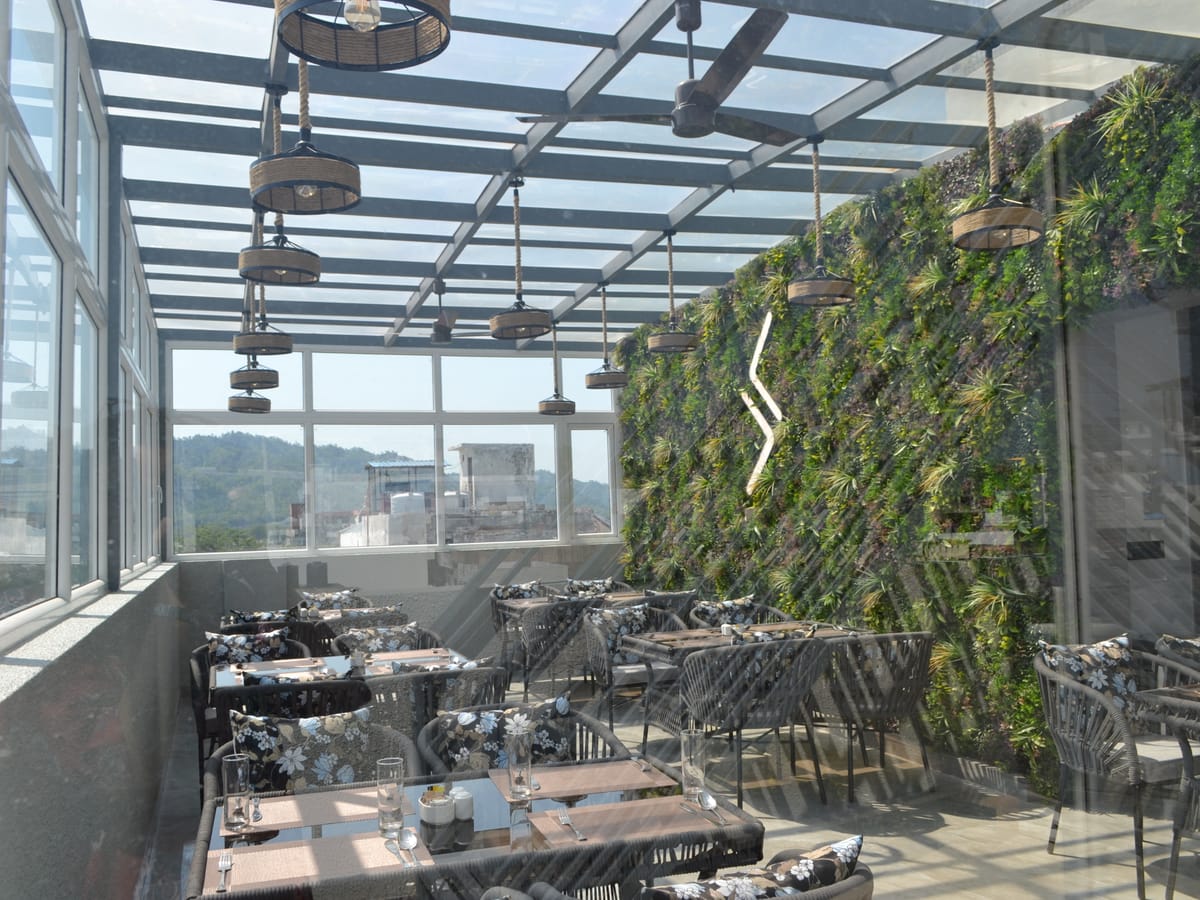 A wide view of Signum Cafe at Signum Tathastu Boutique Hotel, Haridwar