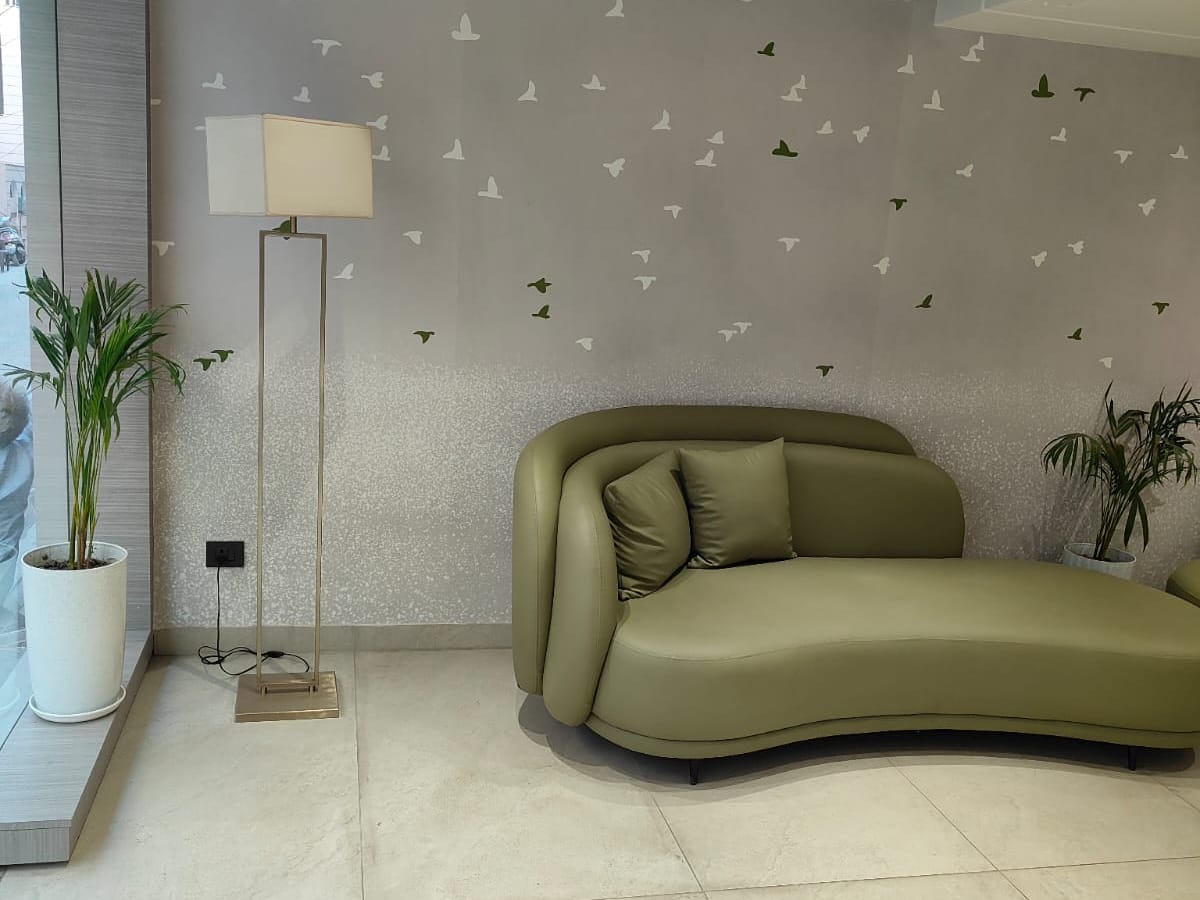 A sofa seating area at Signum Tathastu Boutique Hotel, Haridwar