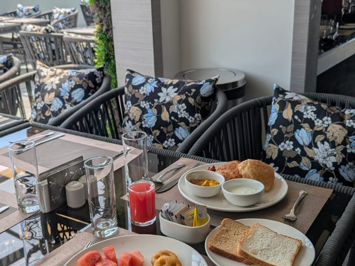 A table laid with food at Signum Tathastu Boutique Hotel, Haridwar