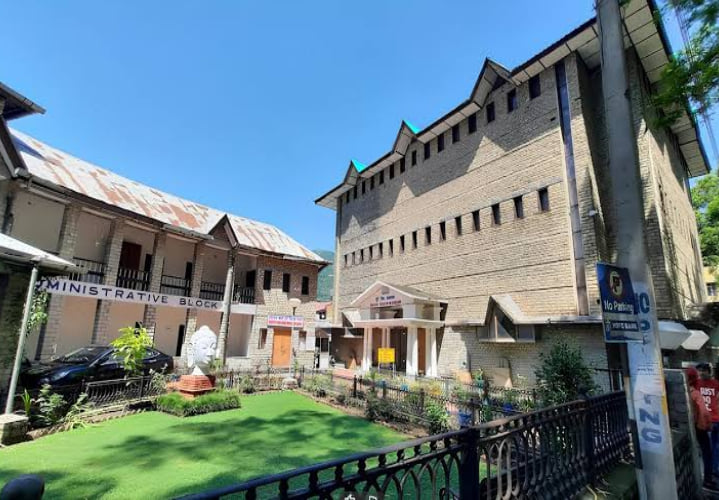 The Bhuri Singh Museum building and lawn in Chamba