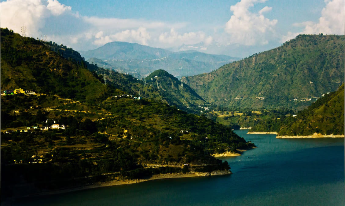 Chamera Lake below forested hills