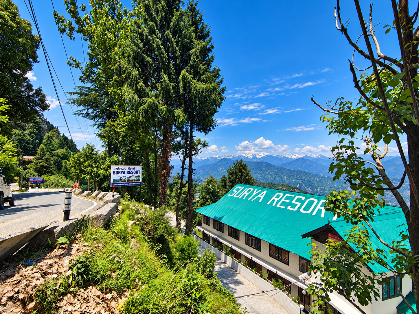 Hotel Surya Resort on the hillside with the valley beyond