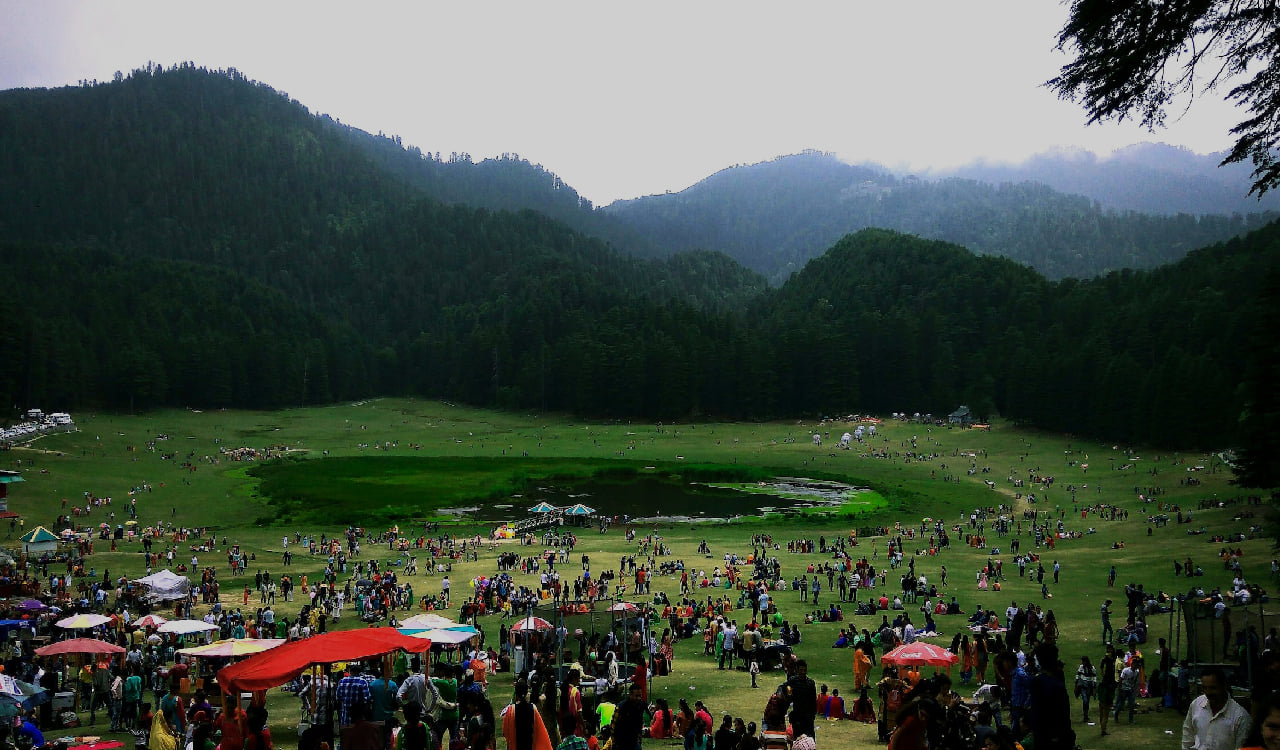 The meadow at Khajjiar ringed by forest