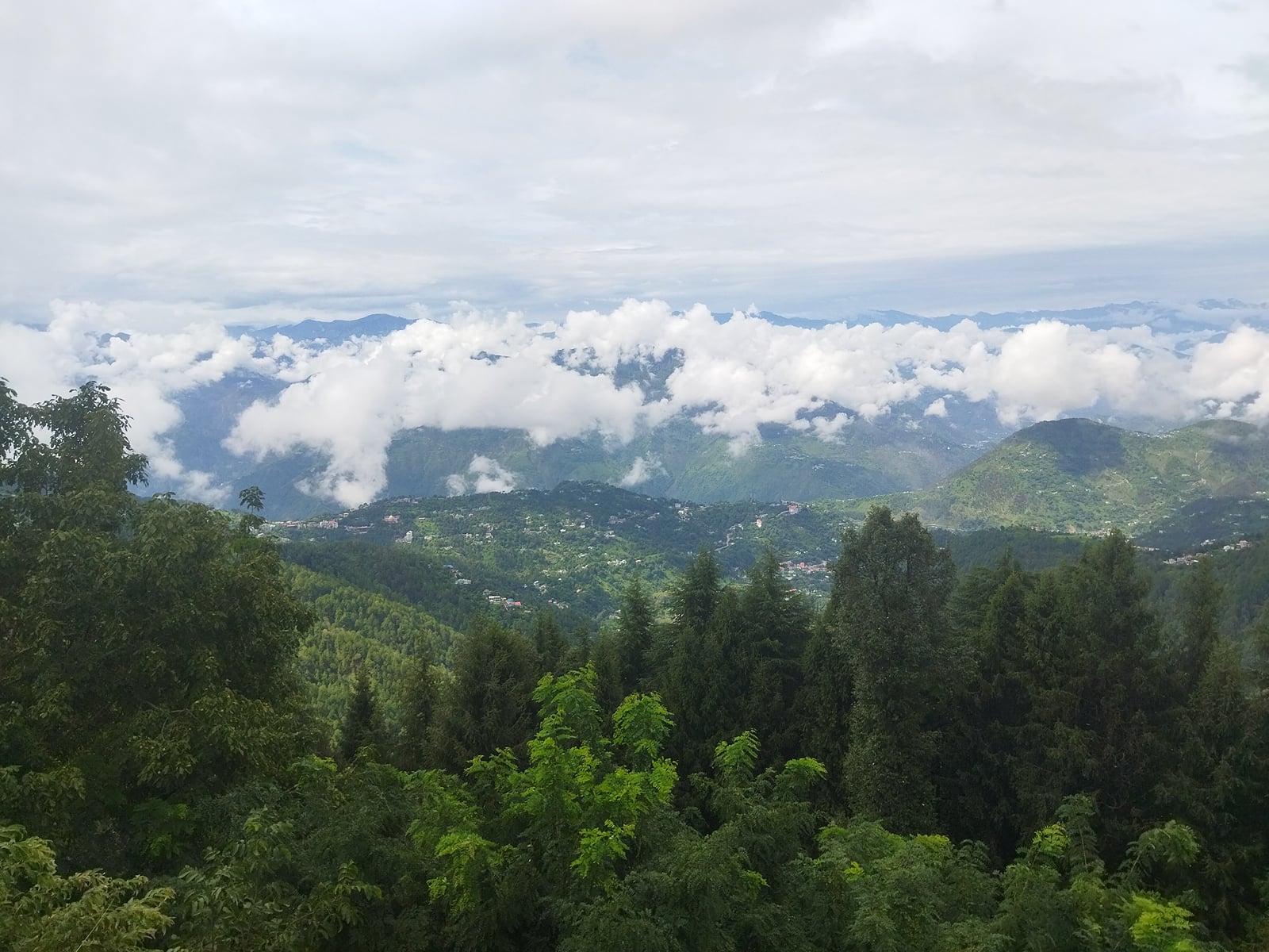 Clouds over the forested valley below Dalhousie
