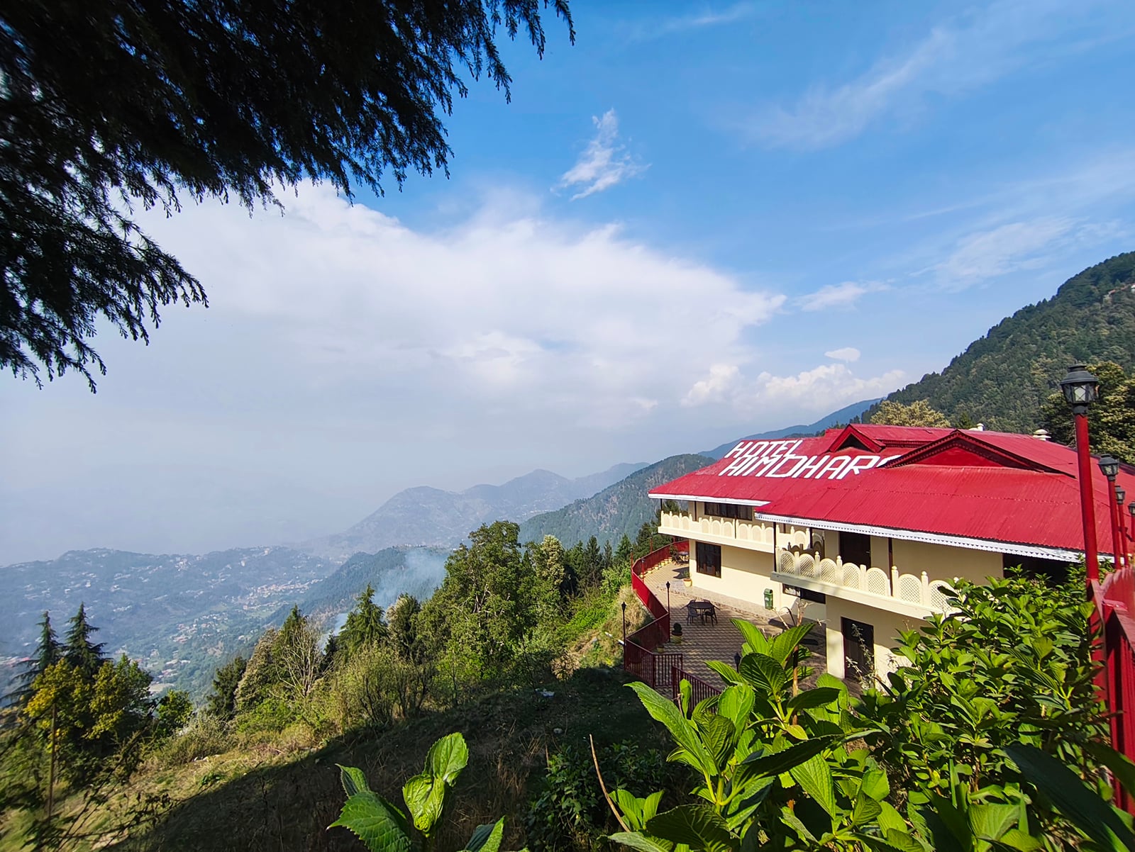 Hotel Himdhara and its red roof above the valley, Dalhousie