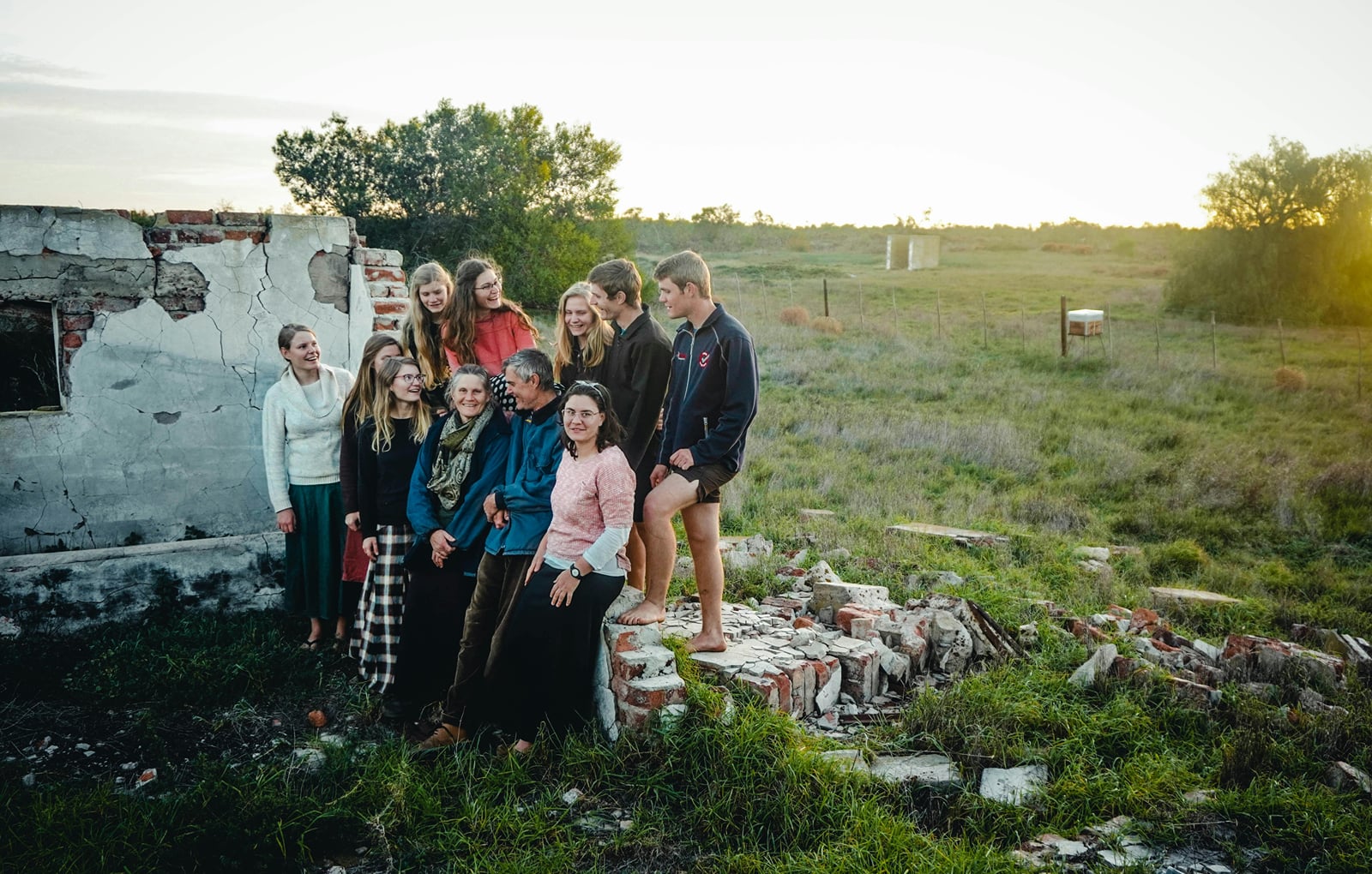 A group of travellers together on a hillside