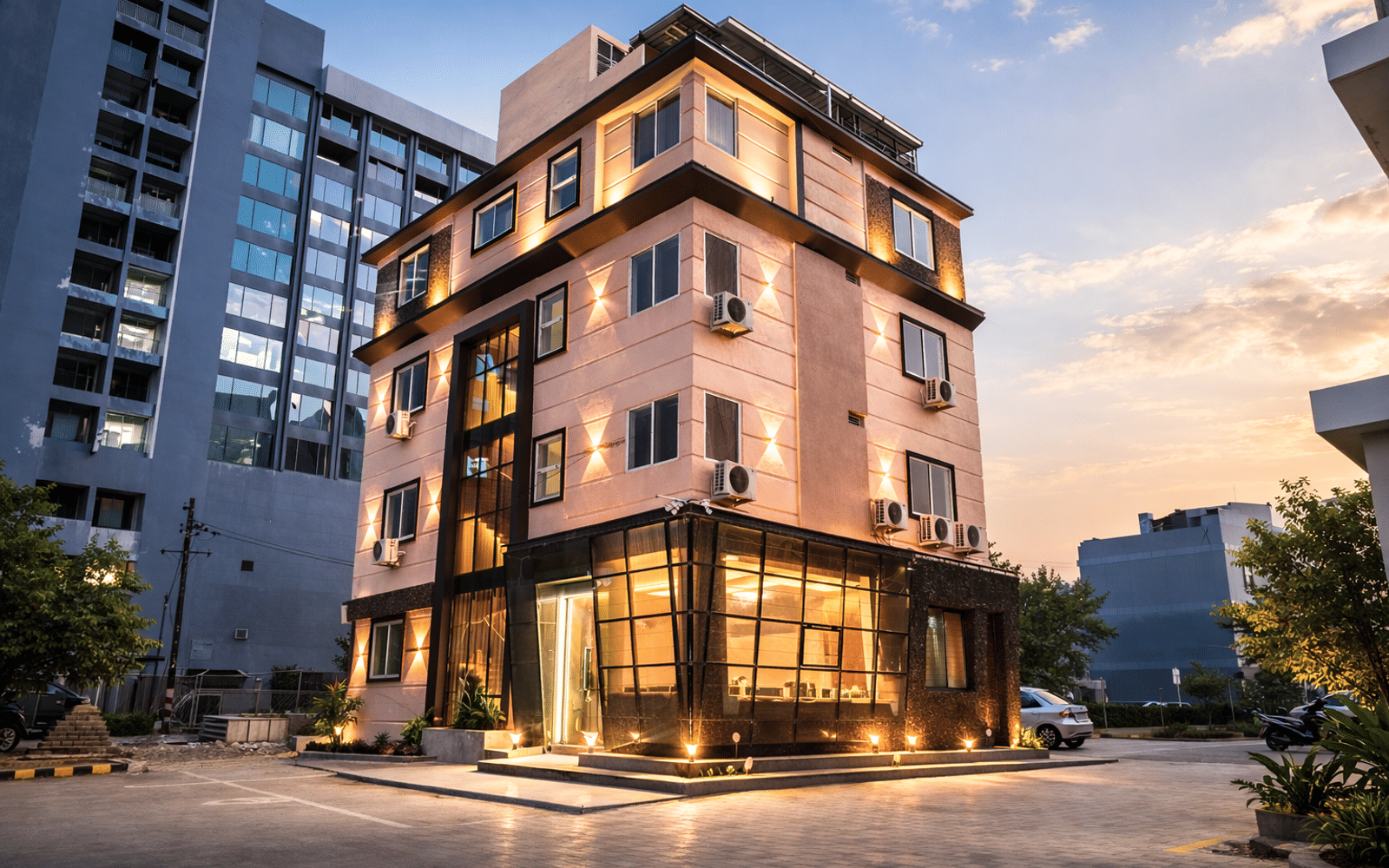 The exterior of Signum CityScapes SKY Boutique Hotel, Indore, at sunset
