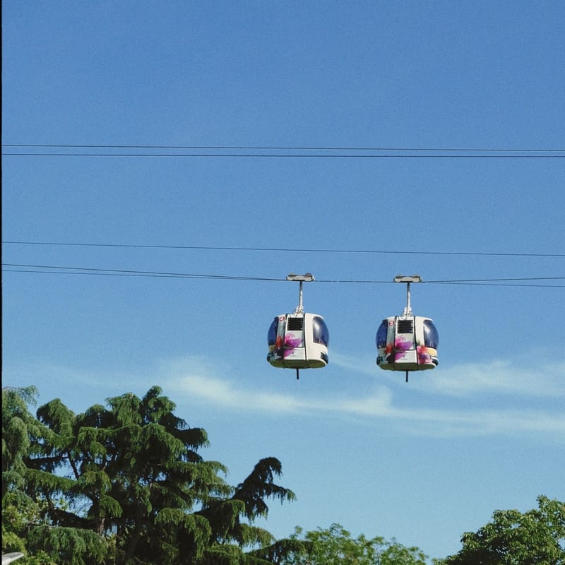 Cable cars on the Haridwar ropeway climbing towards the hilltop temple
