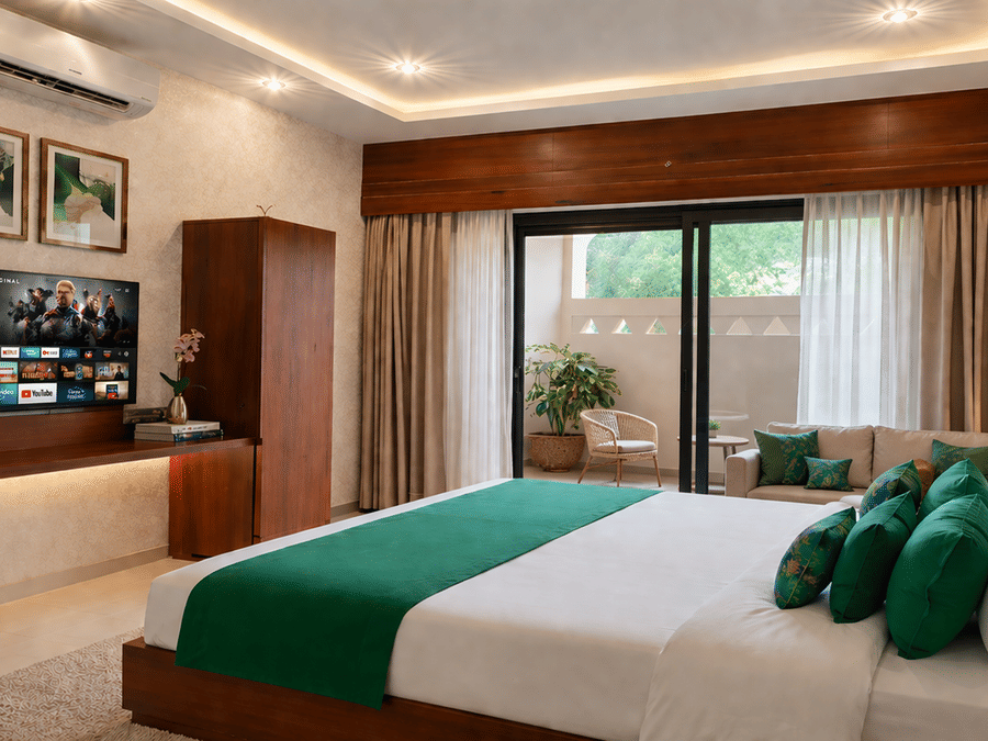 Interior of a deluxe room at Signum Resort, Bandhavgarh