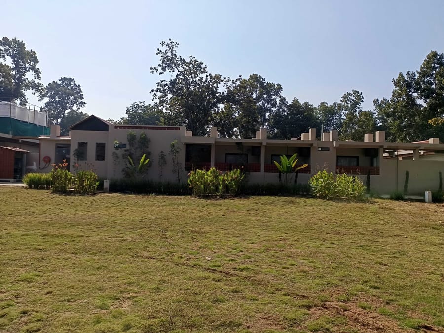 The lawn in front of a guest block at Signum Resort, Bandhavgarh