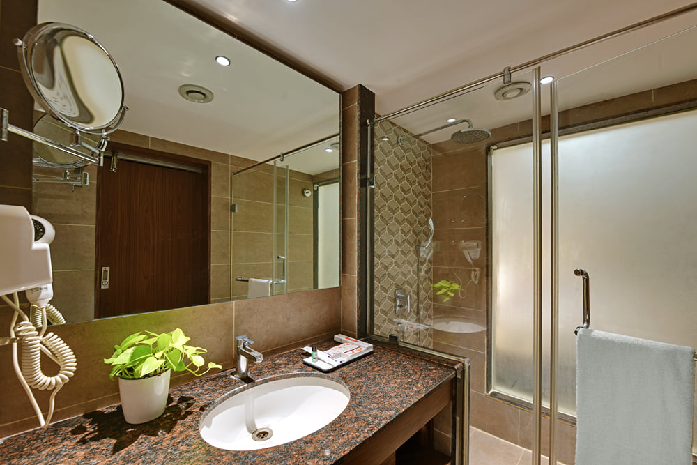 Bathroom with vanity at VIVIDUS Sleek Aarya Mansion